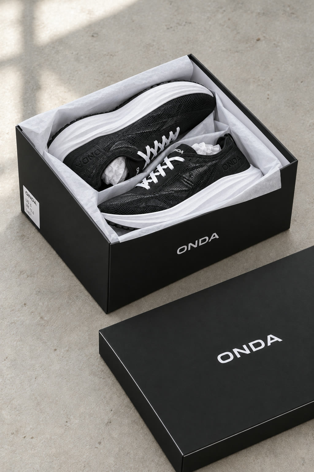 Onda — sneaker dans sa boîte
